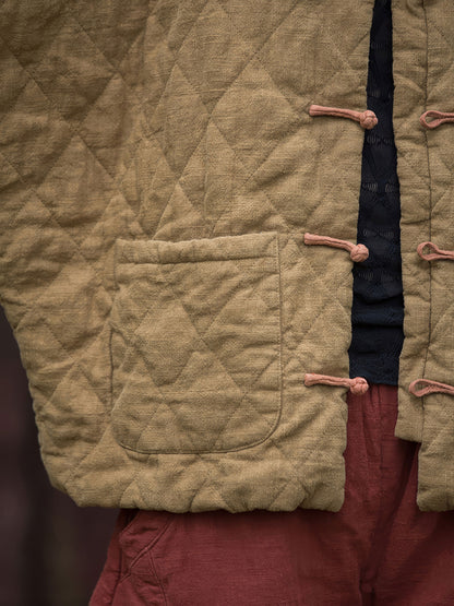 Chaqueta acolchada de ramio y algodón - Detalle de botón tradicional