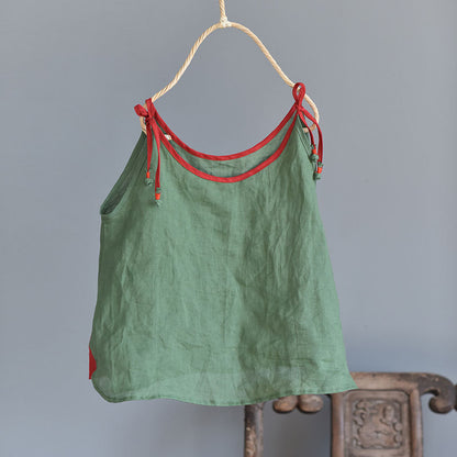Blusa de ramio con tirantes en contraste