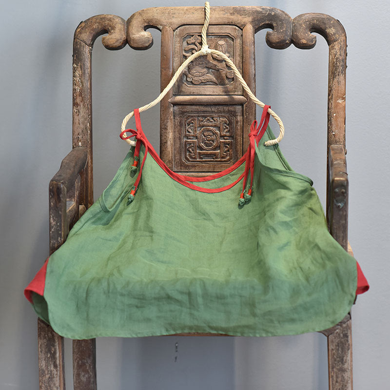 Blusa de ramio con tirantes en contraste