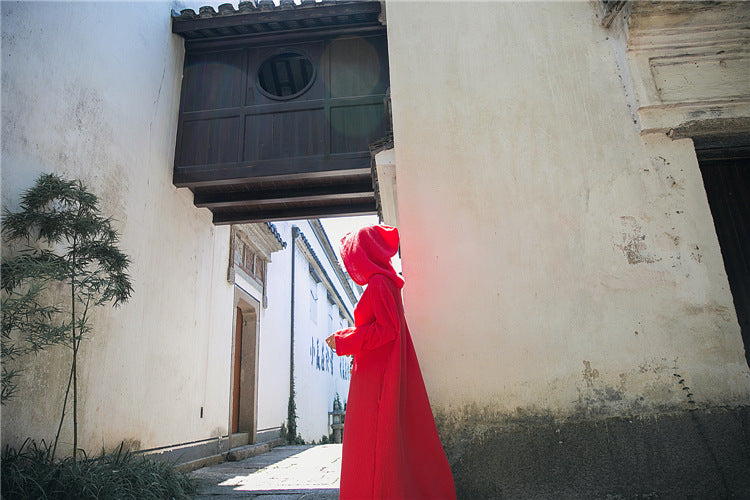 Vestido midi de lino con capucha