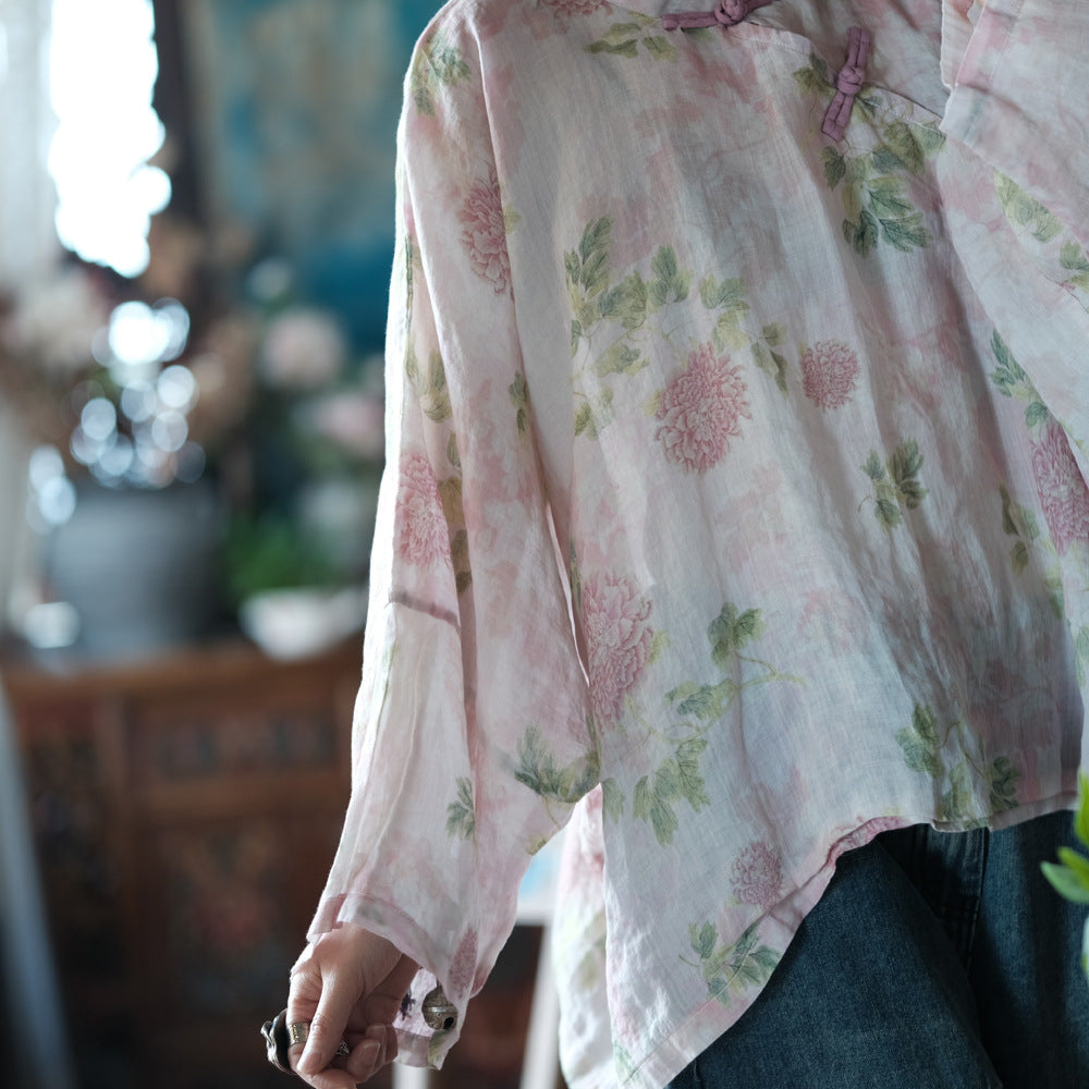 Blusa vintage floral con estampado de viento y cruz