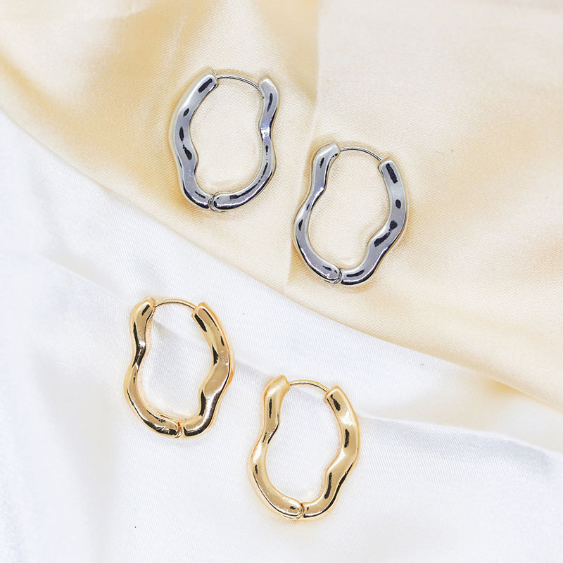 Pendientes de botón de forma irregular de plata de ley 925