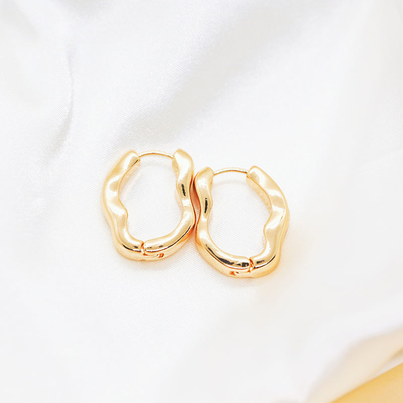 Pendientes de botón de forma irregular de plata de ley 925